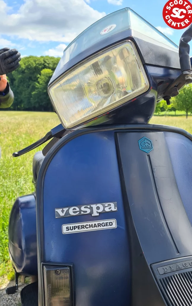 T5 with bgm superstrong sticker under the vespa logo